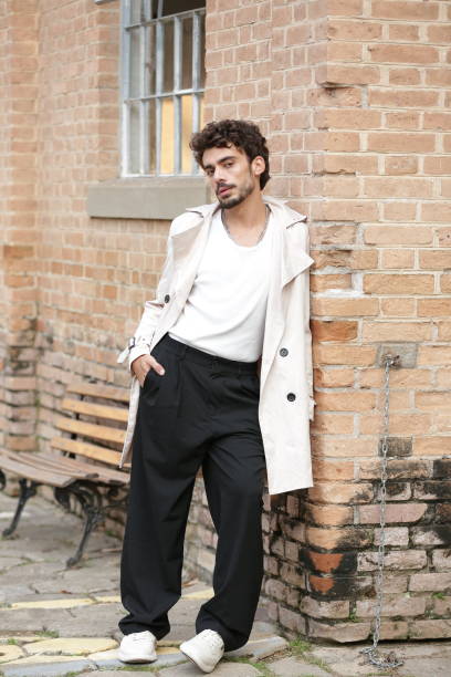 istock Transforming Male Photographic Model Styles into Dynamic Poses and Trend-Setting Outfits. 2183454453
