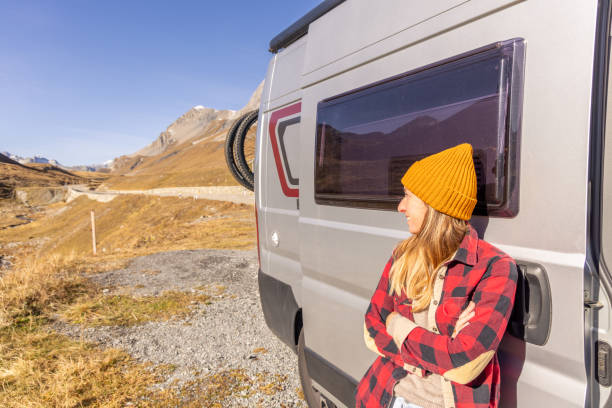 istock Woman living the van life 2183454783