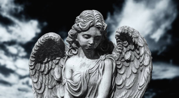 istock Ancient statue of sad angel. Horizontal image. 2183458730
