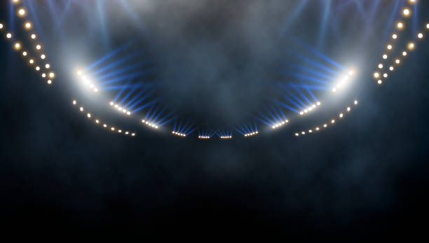 istock Bright stadium arena lights and smoke 2183466317