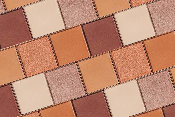 istock Swatches eyeshadow refills as minimal graphic pattern. Matte and glitter pans beige brown copper shade, detailed texture, sun light, minimal trend cosmetics background, beauty product, eye makeup 2183467261