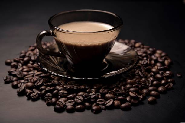 istock Glass cup of coffee with roasted beans 2183470589