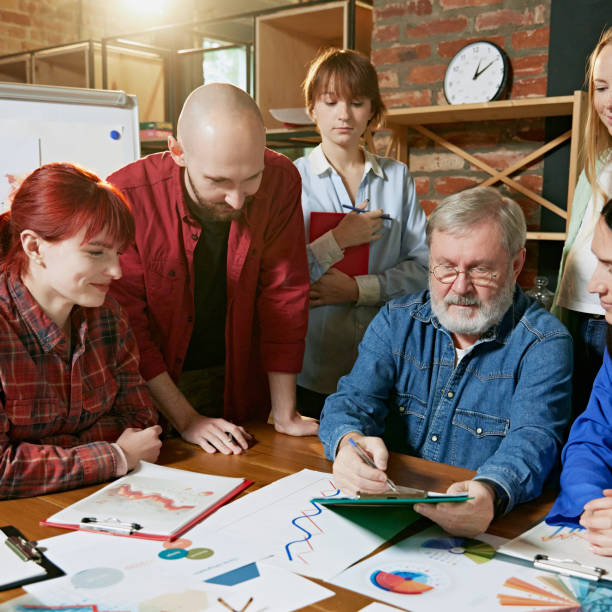 istock Business meeting with professionals focused on achieving company objectives through collaboration and data-driven insights. 2183470977