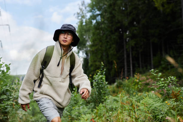 istock Asian Man Travelling in Nature 2183472431