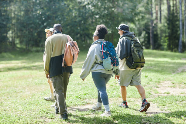 istock Diverse Group of Friends Walking Together in Forest 2183472522