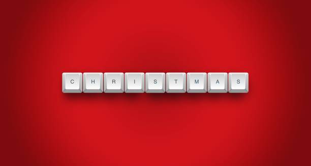 Christmas spelled with keyboard keys on a vibrant red background, ideal for festive and holiday themes.