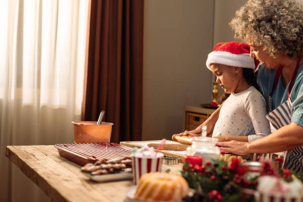 istock Little girl learning how to make cookies 2183474946