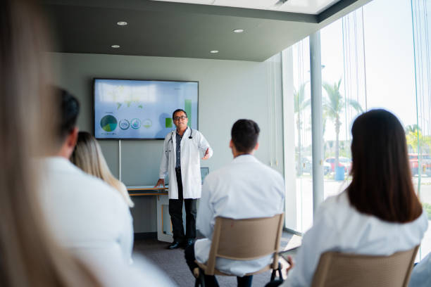 istock Senior doctor man talking during seminar 2183475211