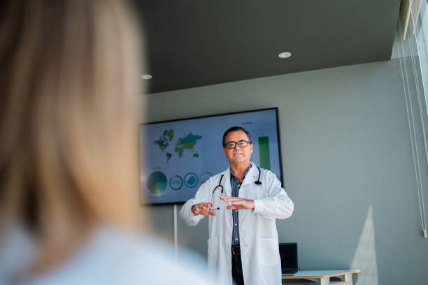 istock Senior doctor man talking during seminar 2183475226