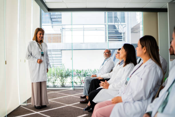 istock Senior doctor woman talking during seminar 2183475472