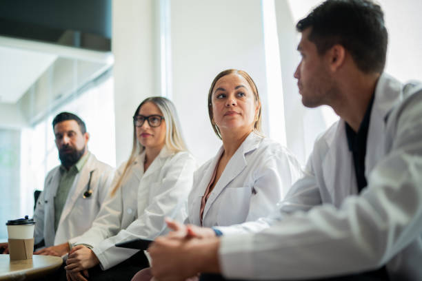 istock Doctors talking during coffee break at convention center 2183475930