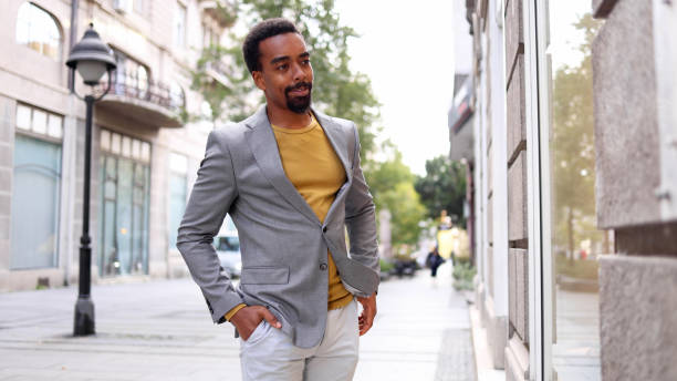istock African American elegant man exploring shops in the city 2183481460