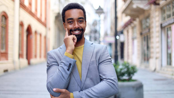 istock Young African American man enjoying a city walk 2183481461