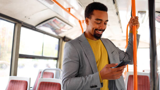 istock African American man scrolling through his phone in the bus 2183481561