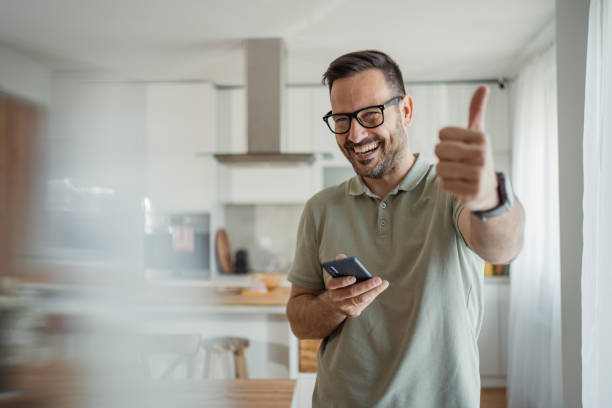 istock Through a screen to the world, a man enjoys digital connectivity 2183489603