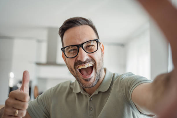 istock Digital smile, handsome man creates perfect selfie 2183489623