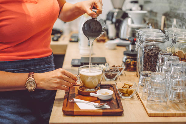istock Barista is working in a coffee shop 2183495922