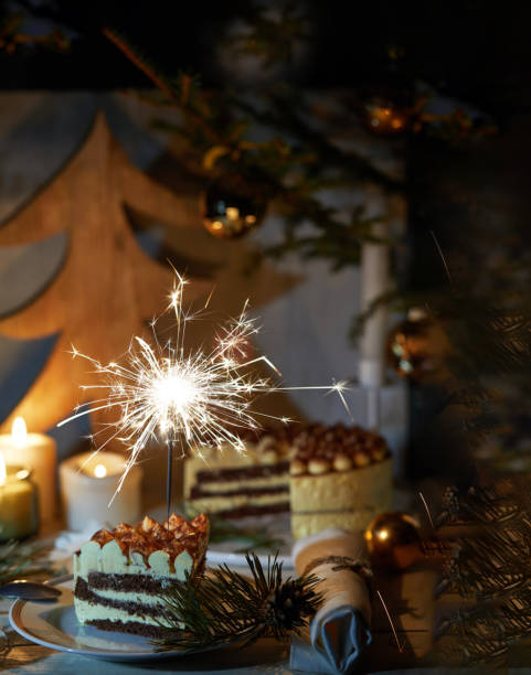 istock Festive sparklers on the Christmas table and mascarpone cake 2183496489