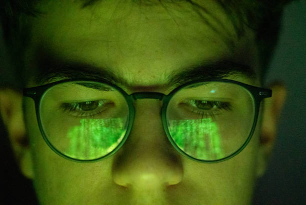 bersecurity, hacking and focus, programming. boy wearing glasses worker and IT specialist coding, programming and thinking
