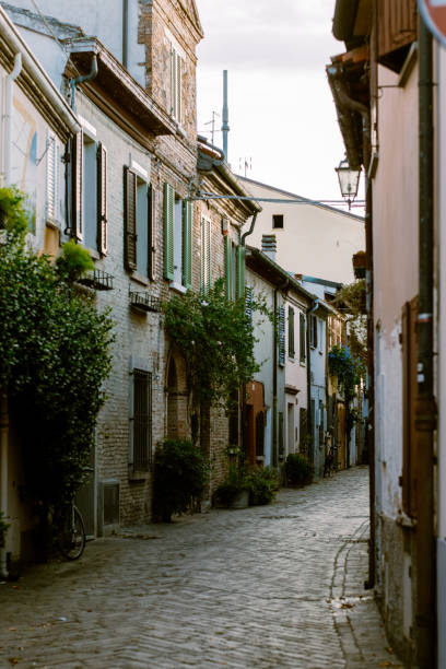 istock colored houses on a narrow street 2183496549