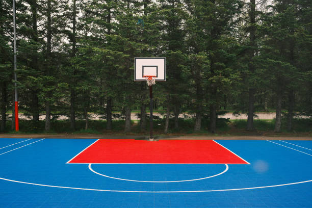 istock Basketball court with red and blue flooring 2183497151
