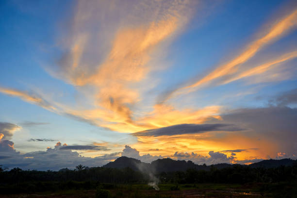 Silhouette of Dramatic sky during sunset over mountain in Tha Sae, Chumphon, Thailand