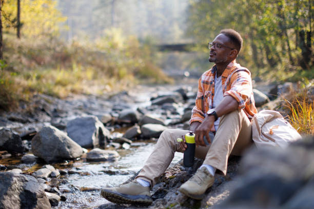 istock Man relaxing in the forest 2183498812