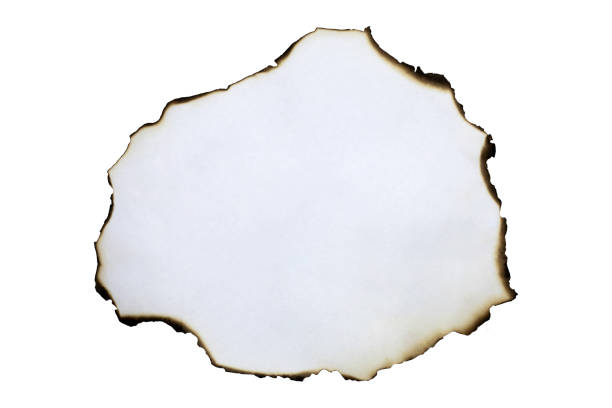 istock White paper with burnt edges isolated on white background with clipping path. 2183499366