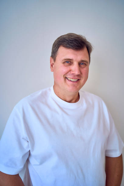 a   portrait of a middle-aged man on a white background