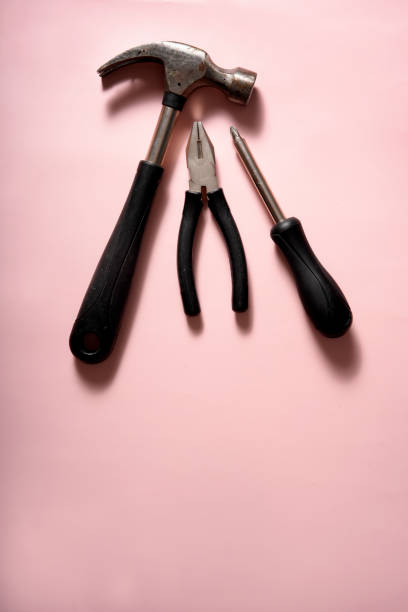 istock set of used tools on pink background 2183500536