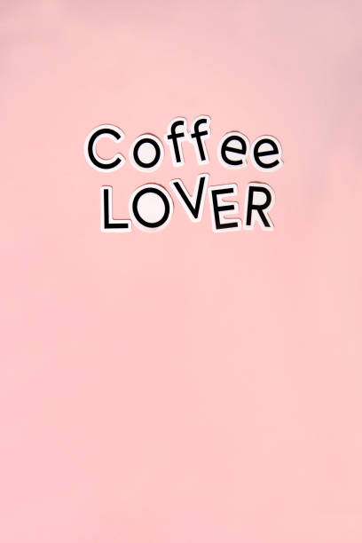 words coffee lover on pink background