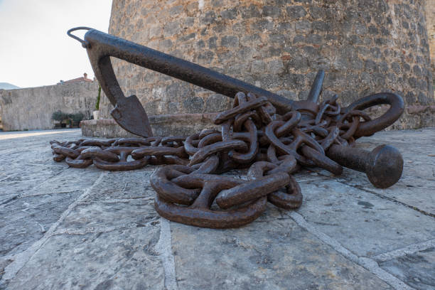 Rusty anchor in medieval Budva Montenegro