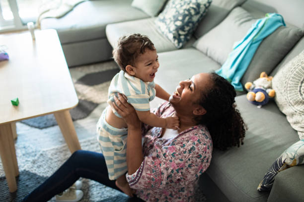 istock Young mother with her son at home 2183501340
