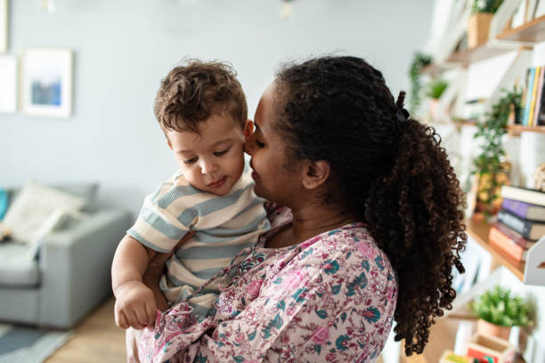 istock Young mother with her son at home 2183501757