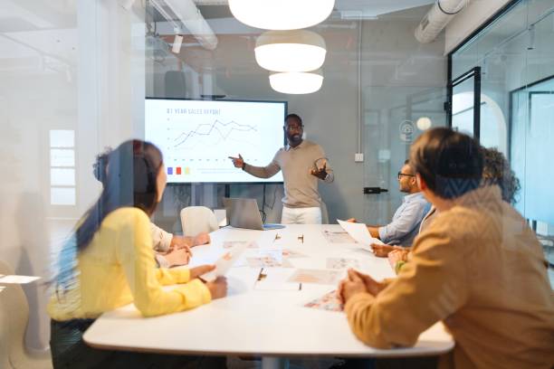 istock Man talking while presenting his new project to his colleagues 2183504619