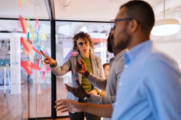 istock Colleagues discussing new projects during a business meeting 2183505240