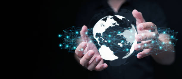 istock whole world in your hands concept. Digital globe with network connection in a man's hand representing the ability to access communication, information, data, and networks globally 2183513978