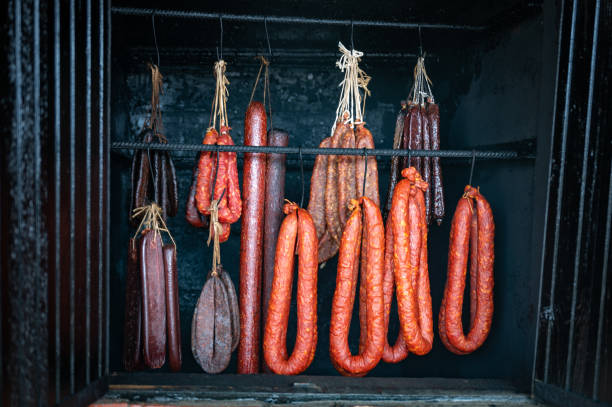 istock hanging rack of various types of sausages 2183514014