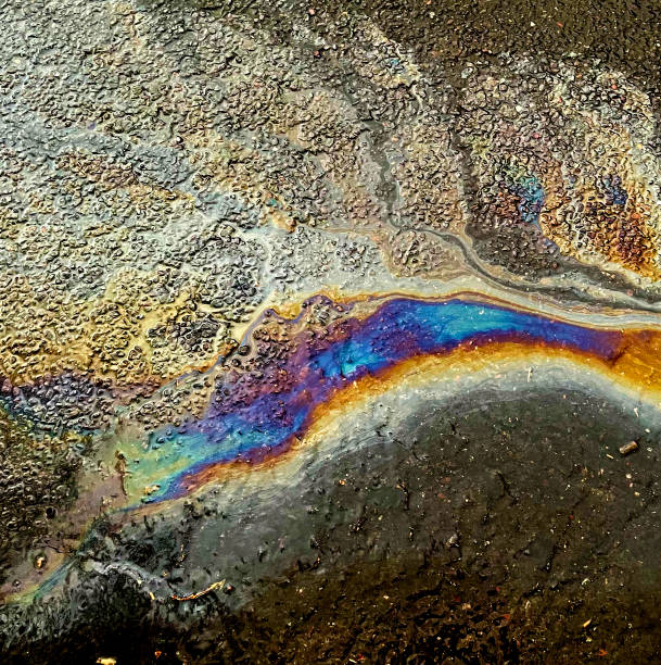 Petrol spill on a wet road