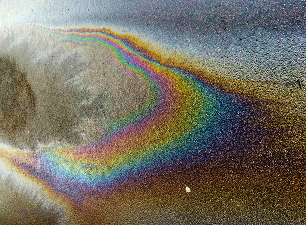 Petrol spill on a wet road