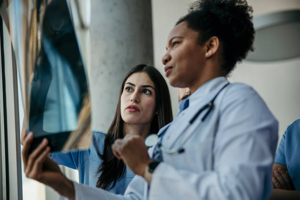 istock Doctor and his medical team working 2183517576