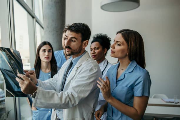 istock Doctor and his medical team working 2183517845