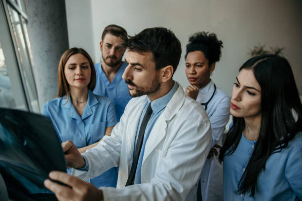 istock Doctor and his medical team working 2183518252