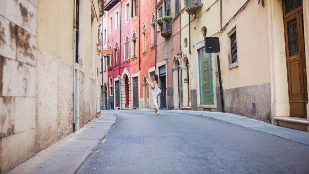 istock Urban Stroll in Vibrant Alley 2183522028
