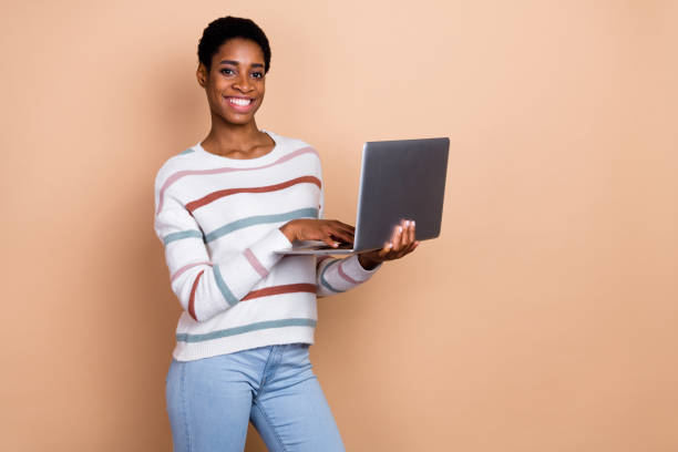istock Photo of pretty funky human dressed pullover chatting modern gadget isolated beige color background 2183522929