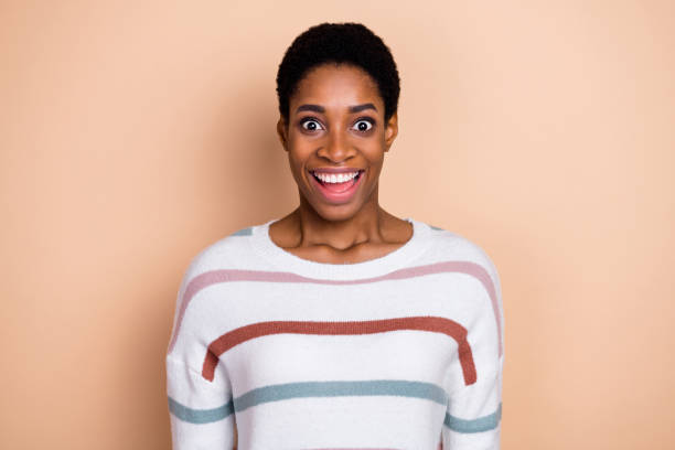 istock Photo of impressed charming human dressed pullover smiling open mouth isolated beige color background 2183523016