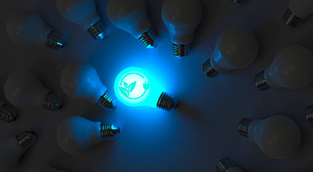 istock Eco-Friendly Light Bulb Glowing Amidst Dark Bulbs - Green Energy Concept 2183523958