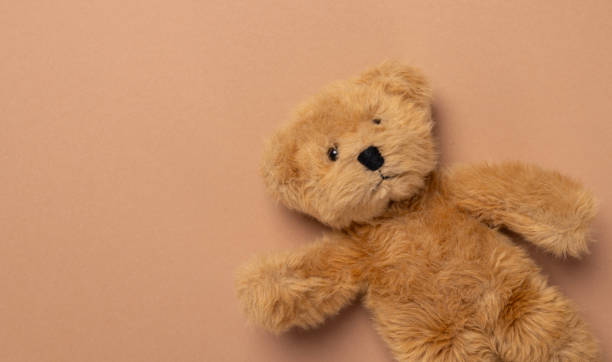 istock Soft toy bears on a beige background 2183529186