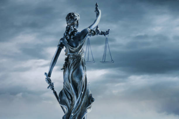 istock Lady Justice And Storm Clouds 2183530460