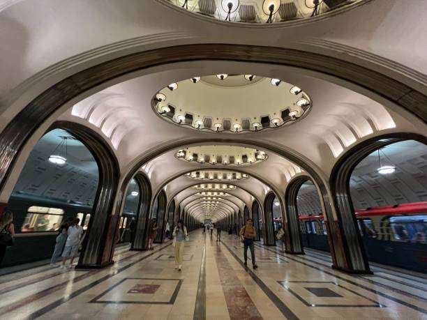 Moscow, Russia - June 15, 2024: Mayakovskaya station of Moscow Subway with people walking through the station, waiting for train